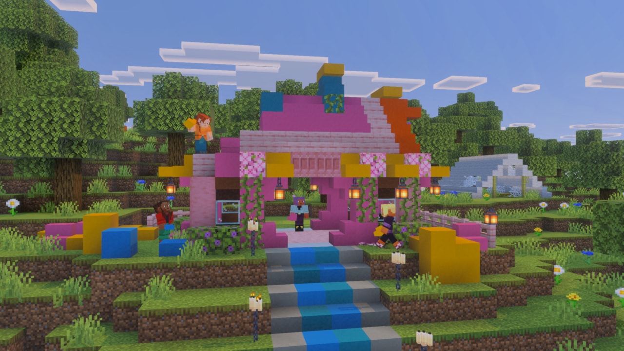 A house built from colorful concrete stairs and slabs in Minecraft 26.3, with an abandoned camp on the right